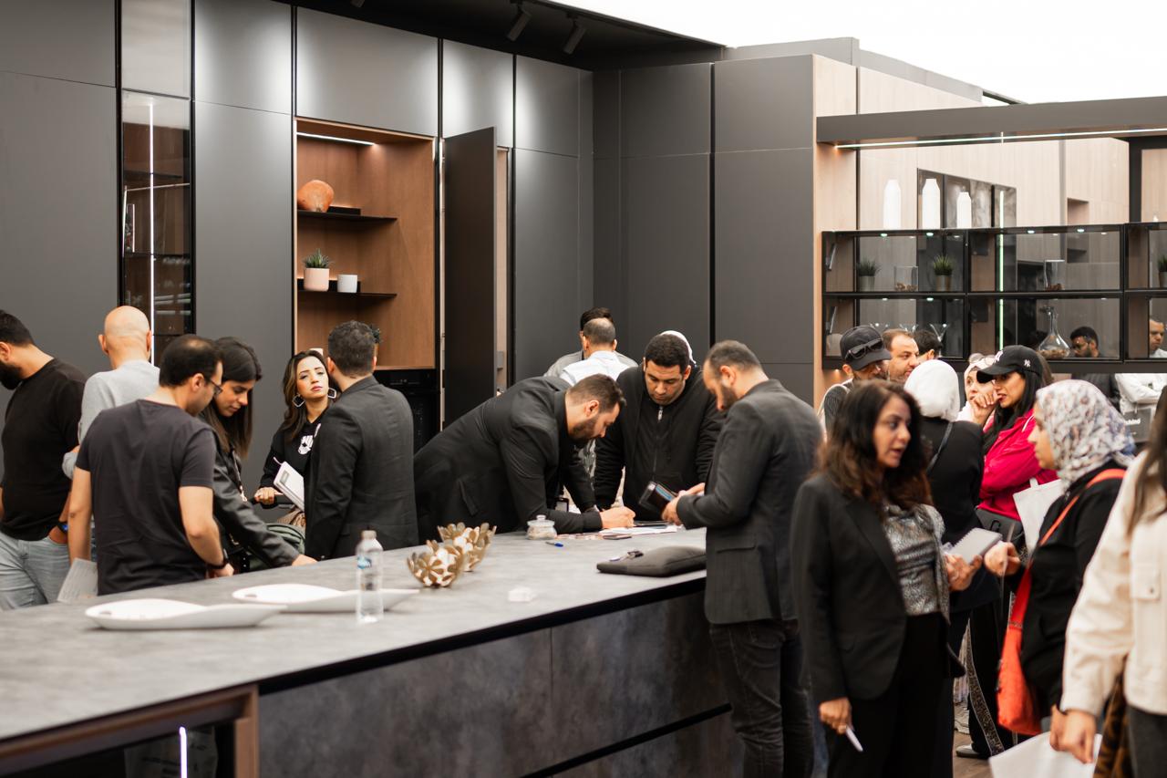 Visitors at the Kitchino Le Marché stand